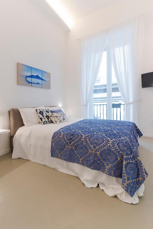 Posteľ alebo postele v izbe v ubytovaní A Misura Duomo Rooms & Apartment - LS Accommodations