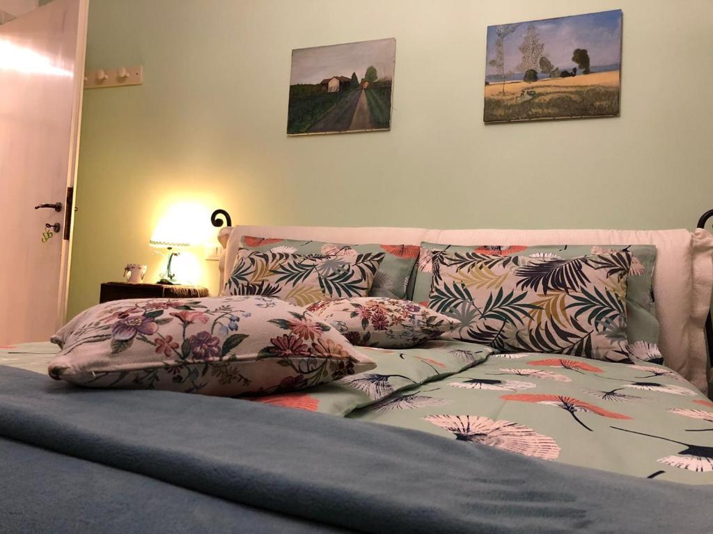 Postel nebo postele na pokoji v ubytování Dimora Naviglio
