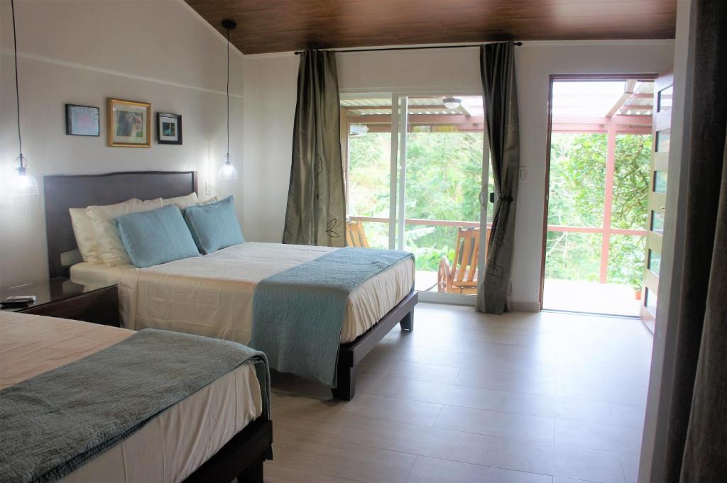 Postel nebo postele na pokoji v ubytování Casa Donna Rosa B&B