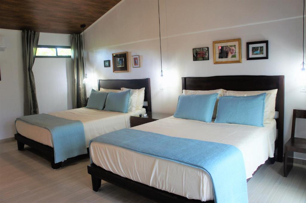 Postel nebo postele na pokoji v ubytování Casa Donna Rosa B&B
