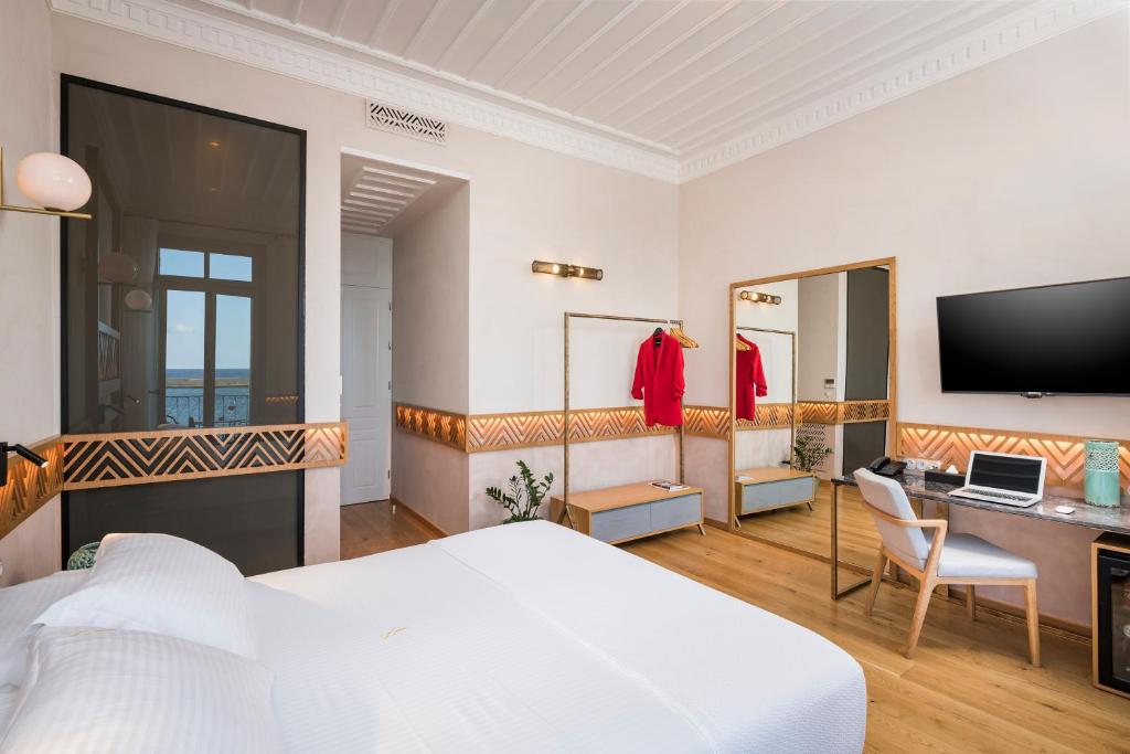 Postel nebo postele na pokoji v ubytování Scala de Faro