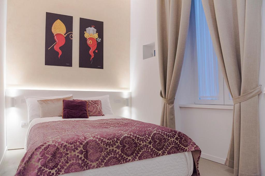 Posteľ alebo postele v izbe v ubytovaní A Misura Duomo Rooms & Apartment - LS Accommodations