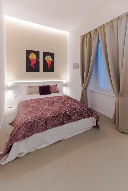Posteľ alebo postele v izbe v ubytovaní A Misura Duomo Rooms & Apartment - LS Accommodations