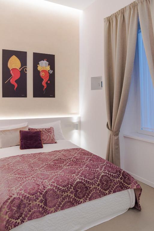 Posteľ alebo postele v izbe v ubytovaní A Misura Duomo Rooms & Apartment - LS Accommodations