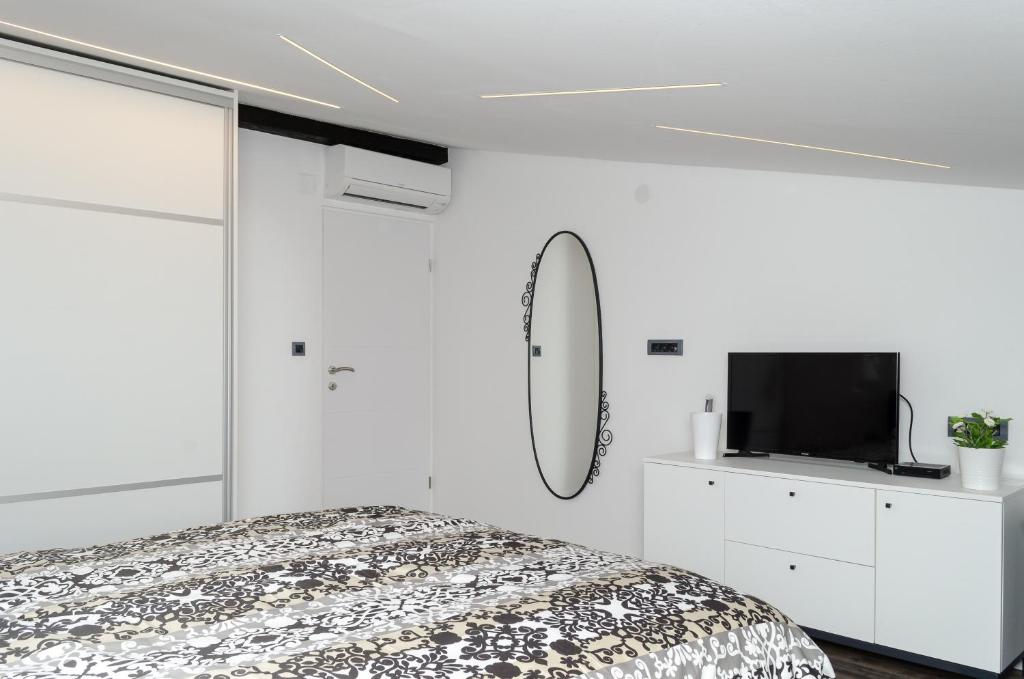 Posteľ alebo postele v izbe v ubytovaní Grey apartment Zagreb