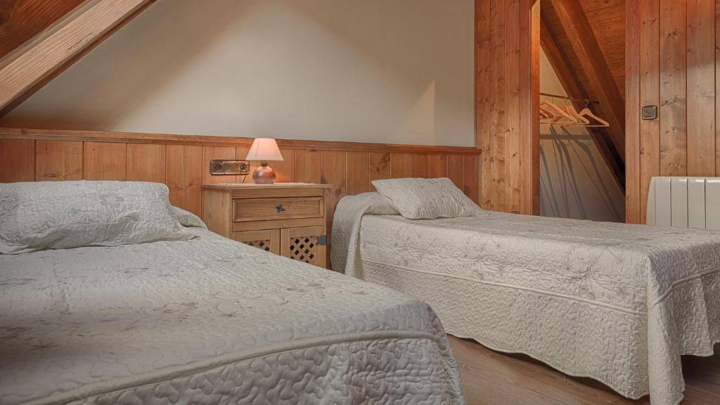 Postel nebo postele na pokoji v ubytování Casa Irissa