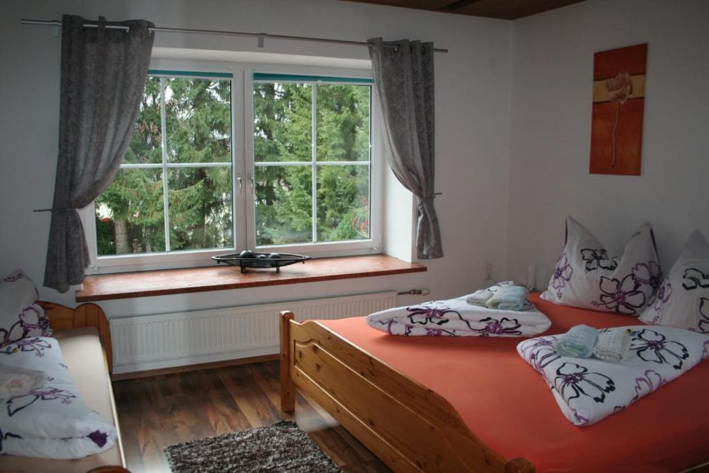 Postel nebo postele na pokoji v ubytování Haus Emily