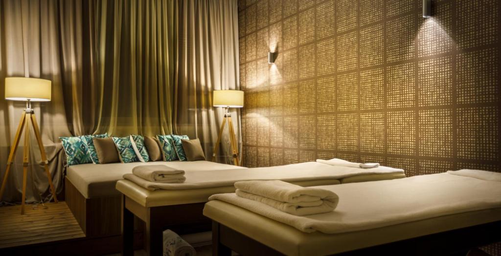 Кровать или кровати в номере Valamar Argosy Hotel