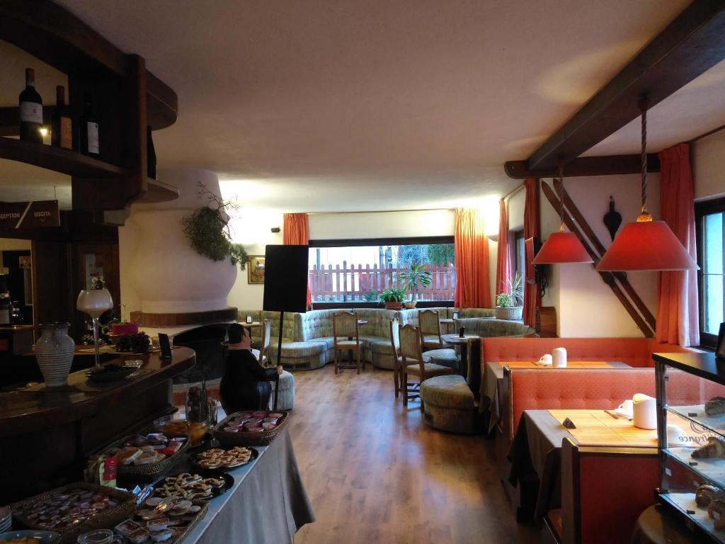 Posezení v ubytování Hotel I Larici