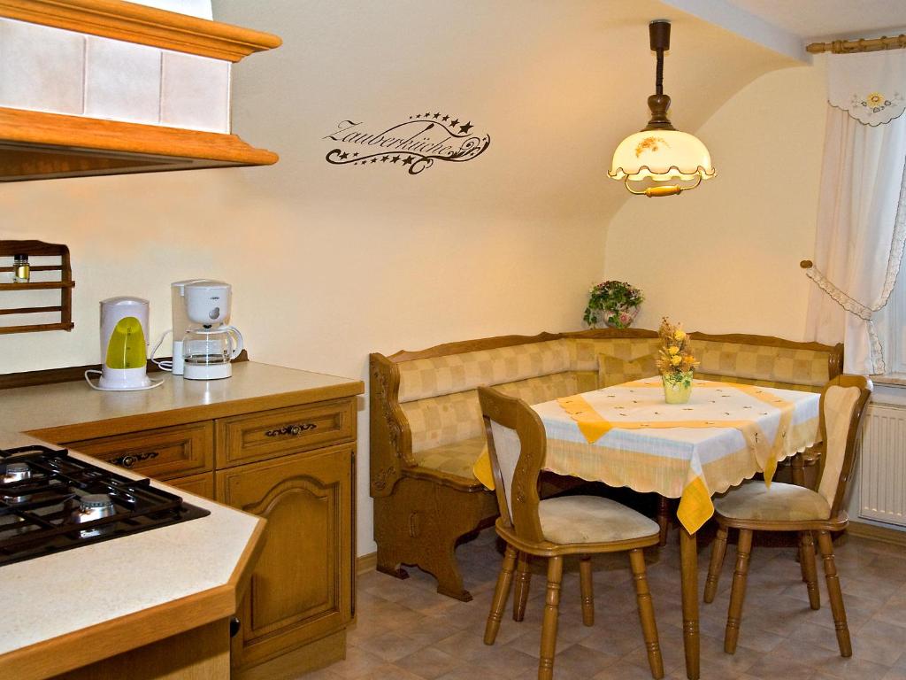 Kuchyň nebo kuchyňský kout v ubytování Panoramaferienwohnung Bergwiese