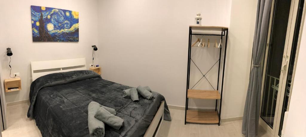 Posteľ alebo postele v izbe v ubytovaní B&B Priezza