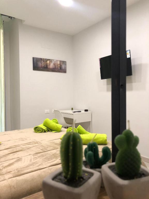Posteľ alebo postele v izbe v ubytovaní B&B Priezza