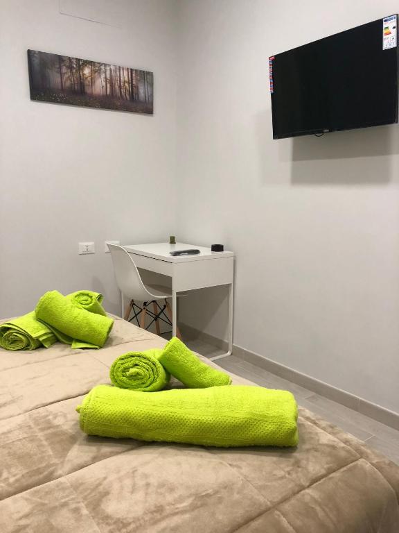 Televízia a/alebo spoločenská miestnosť v ubytovaní B&B Priezza