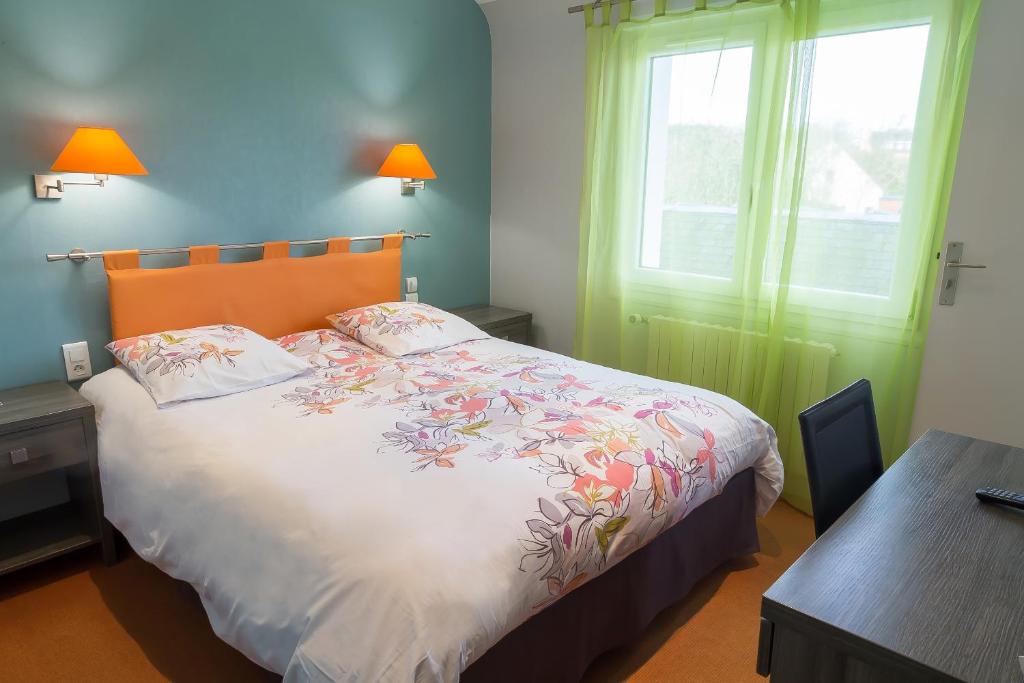 Postel nebo postele na pokoji v ubytování Hostellerie De La Mer