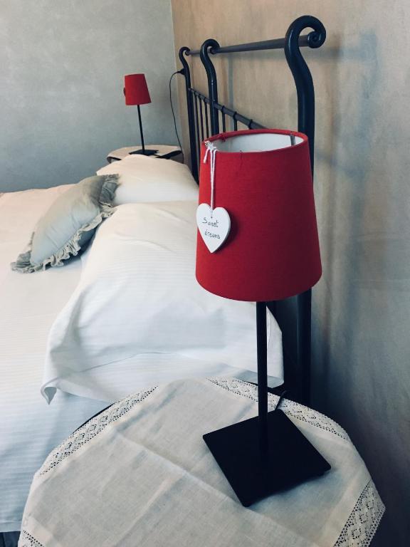 Postel nebo postele na pokoji v ubytování Casa Chiara B&B