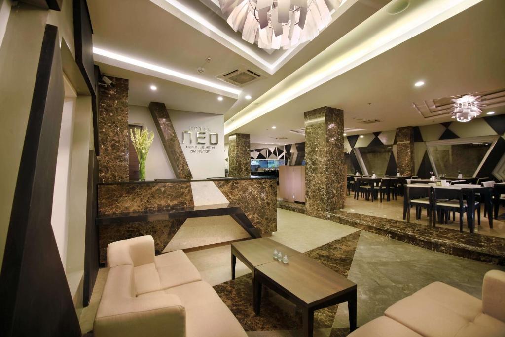 TV a/nebo společenská místnost v ubytování Hotel Neo - Kuta, Jelantik