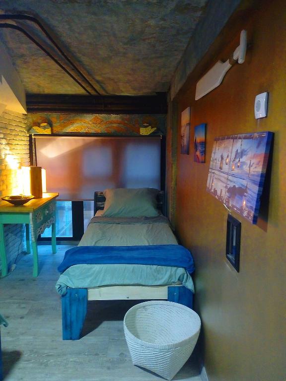 Postel nebo postele na pokoji v ubytování NapPARK Hostel