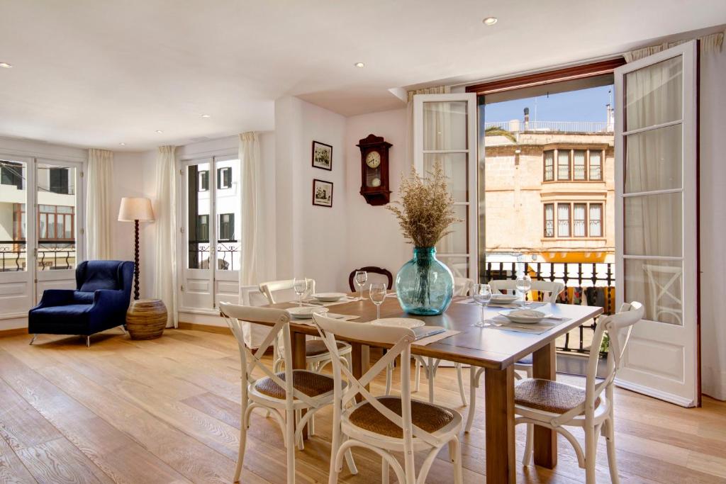 a dining room with a table and chairs at Holiday Home Casa Nova by Mauter Villas in Ciutadella