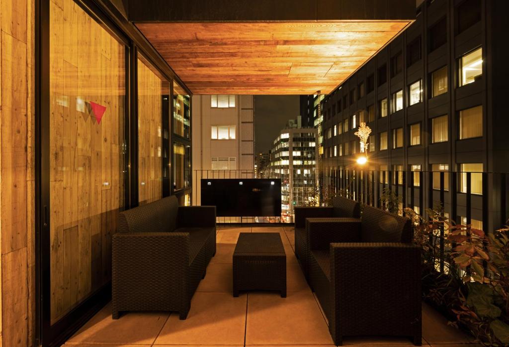 TV a/nebo společenská místnost v ubytování bnb+ Kanda Terrace Ogawamachi