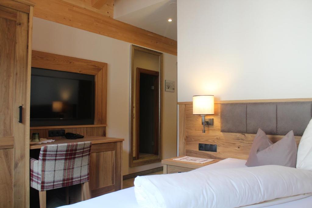 Postel nebo postele na pokoji v ubytování Hotel Glöckner und Hotel Residenz Glöckner