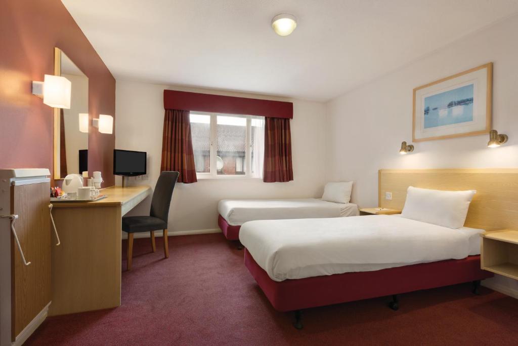 Postel nebo postele na pokoji v ubytování Days Inn Hotel Gretna Green