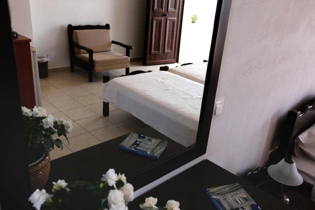 Postel nebo postele na pokoji v ubytování Hotel Melikari