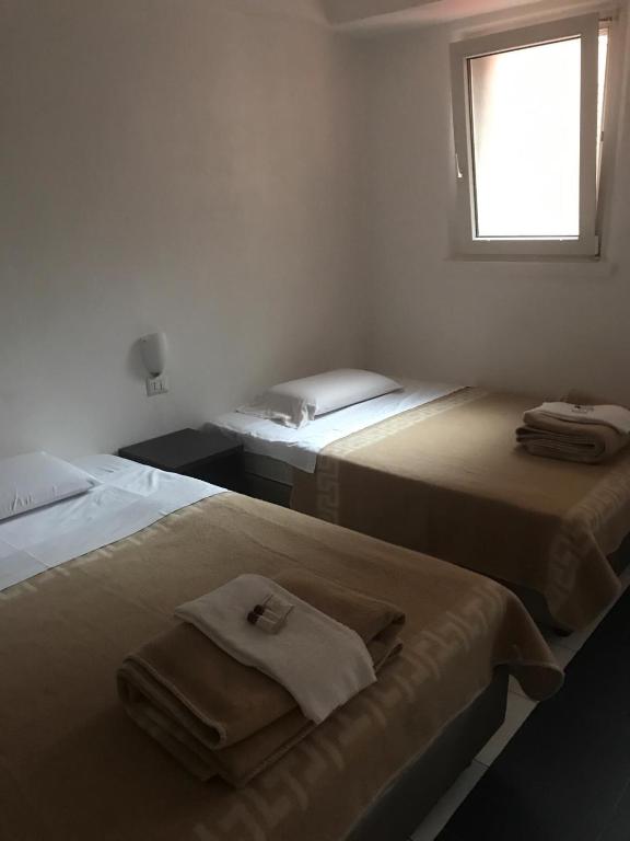 Postel nebo postele na pokoji v ubytování NEW GENERATION HOSTEL Milan center