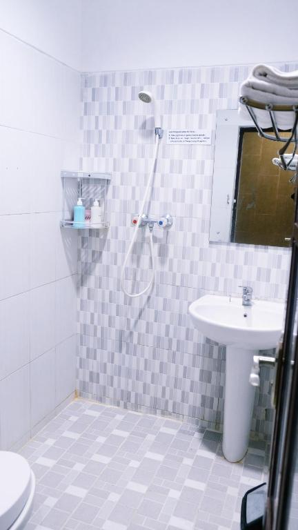 Koupelna v ubytování BeOne House Jogja