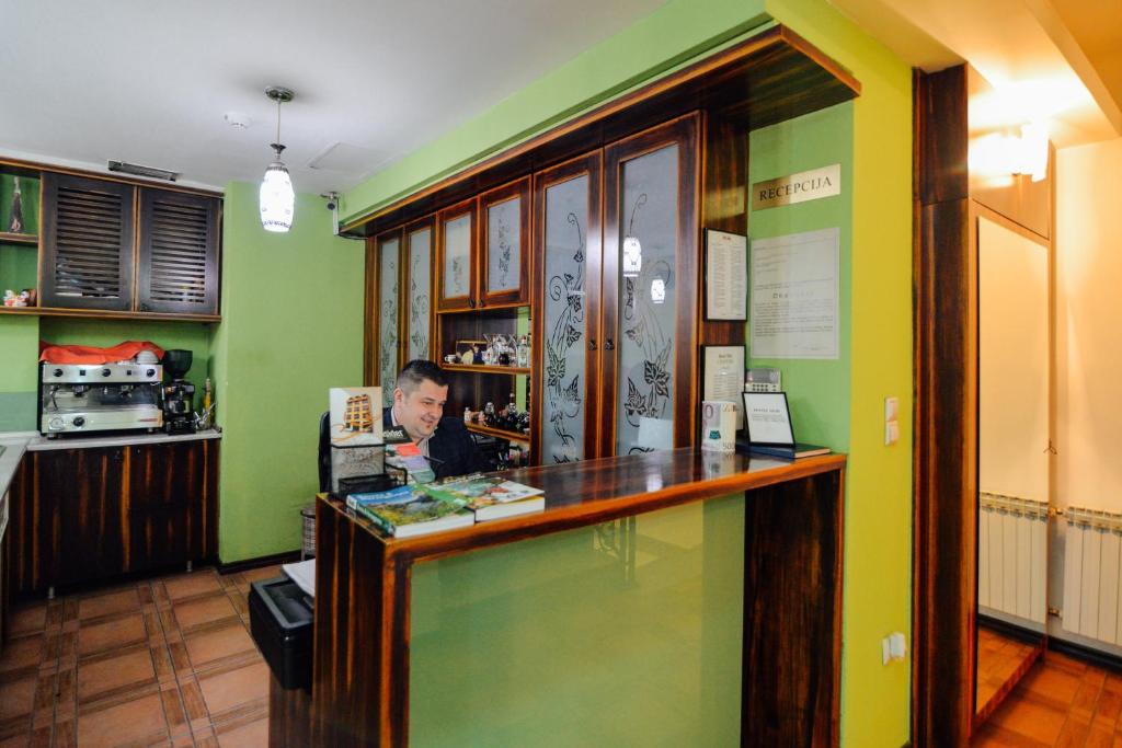 Kuchyň nebo kuchyňský kout v ubytování Hotel Mod
