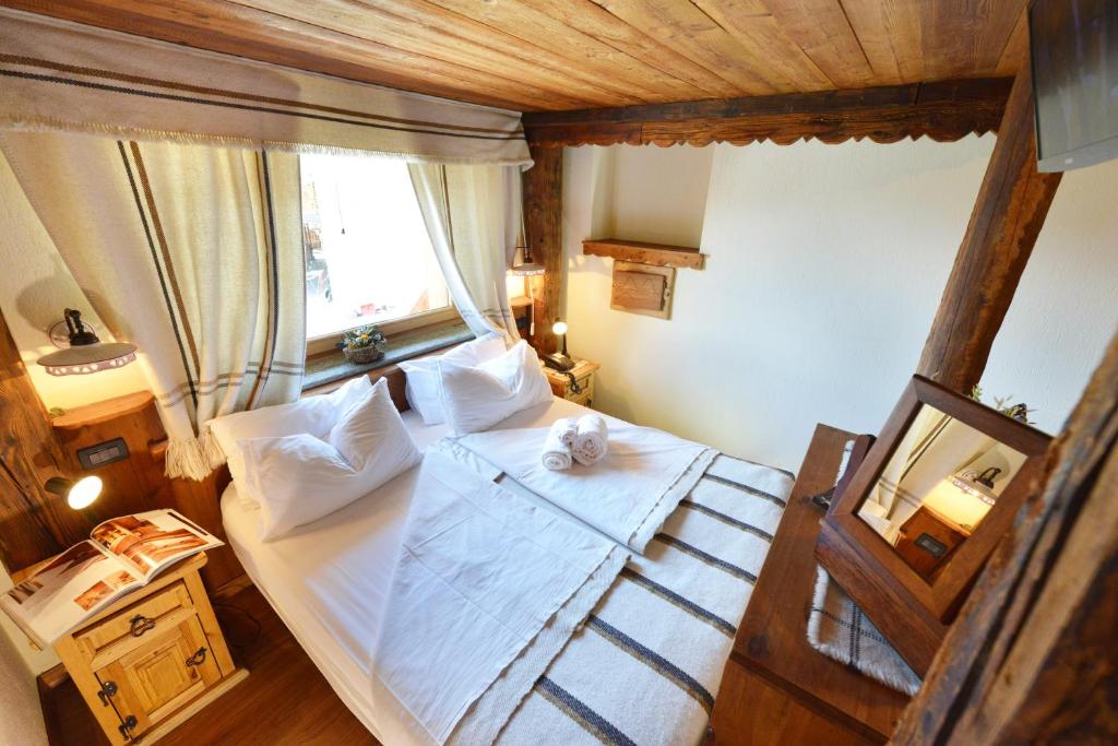 Postel nebo postele na pokoji v ubytování Affittacamere De Charme Jour Et Nuit