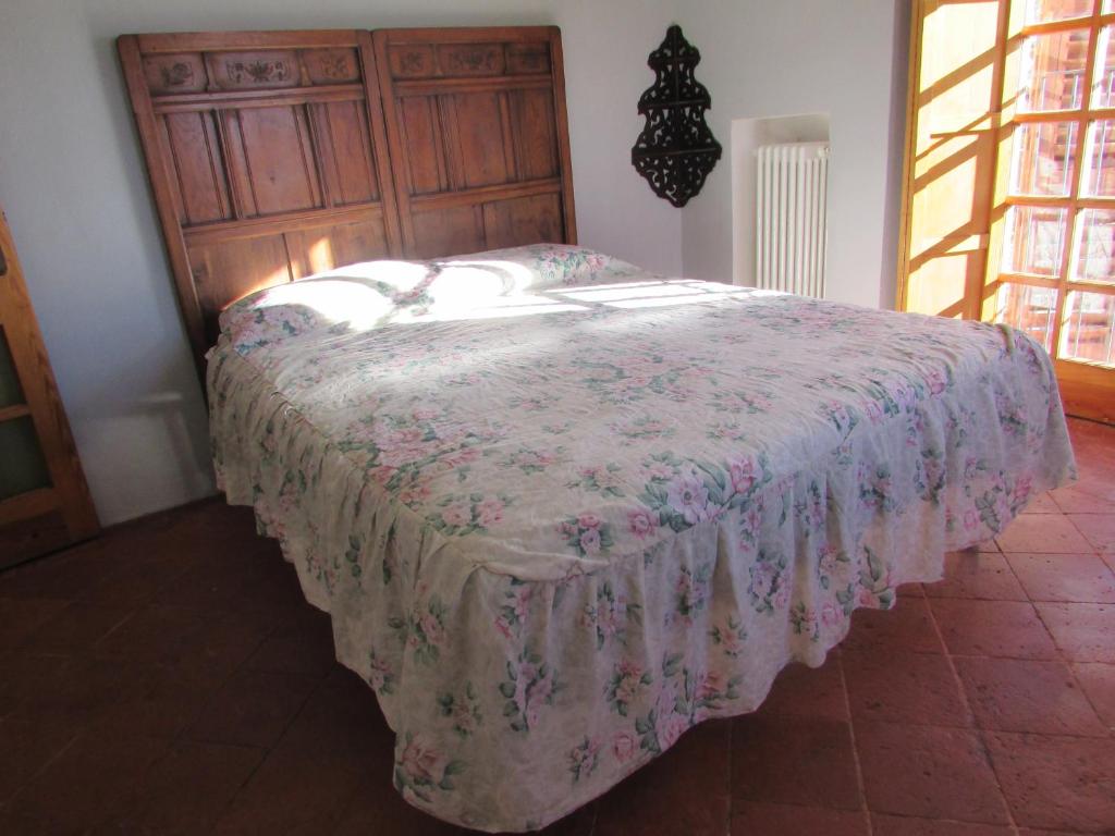 Postel nebo postele na pokoji v ubytování La Terrazza Mombarone