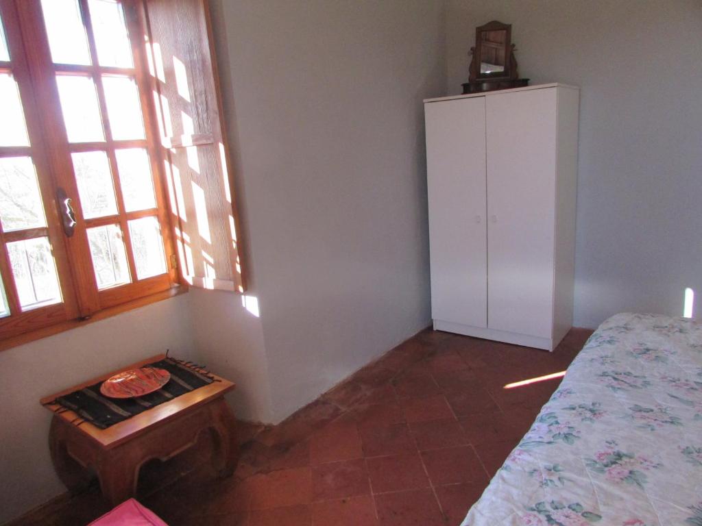 Postel nebo postele na pokoji v ubytování La Terrazza Mombarone