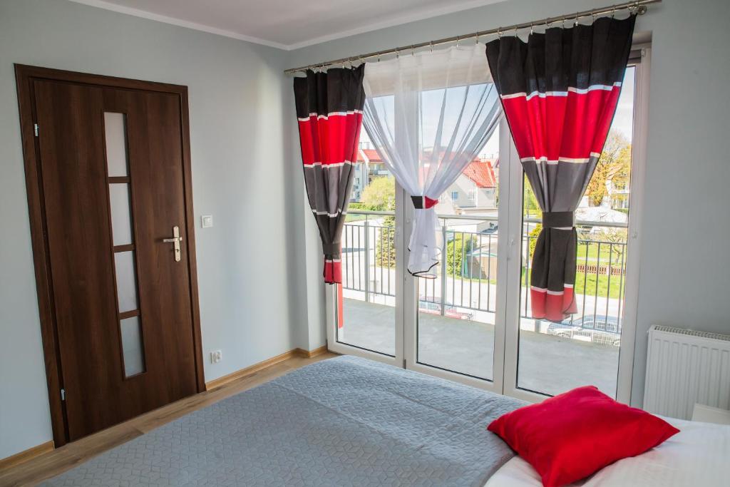 Posteľ alebo postele v izbe v ubytovaní Family Homes - Apartamenty Sonoma