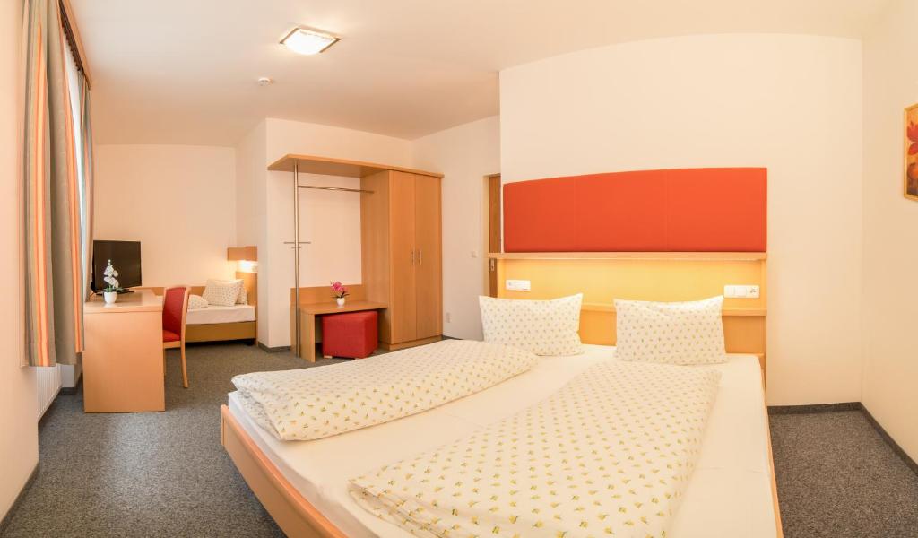 Posteľ alebo postele v izbe v ubytovaní Hotel Gasthof Stefansbrücke