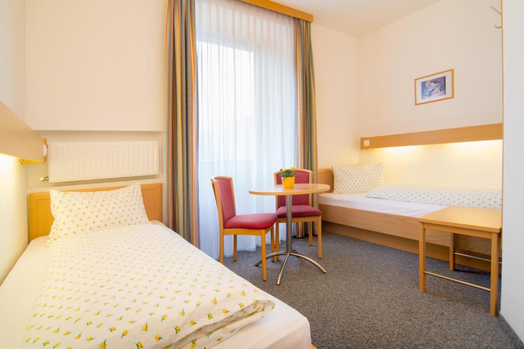 Posteľ alebo postele v izbe v ubytovaní Hotel Gasthof Stefansbrücke