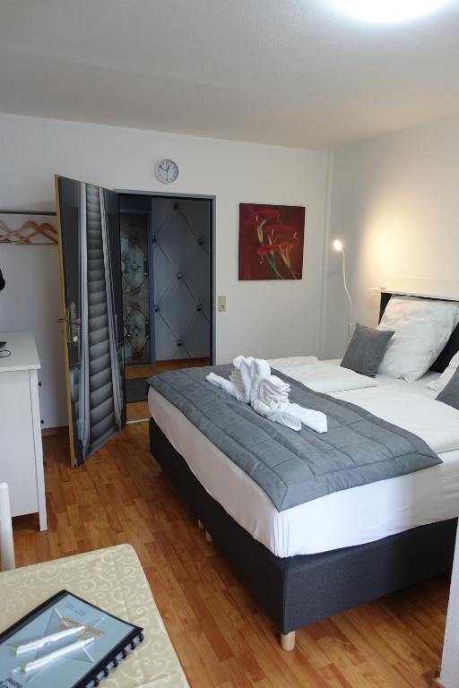 Postel nebo postele na pokoji v ubytování Stern Hotel