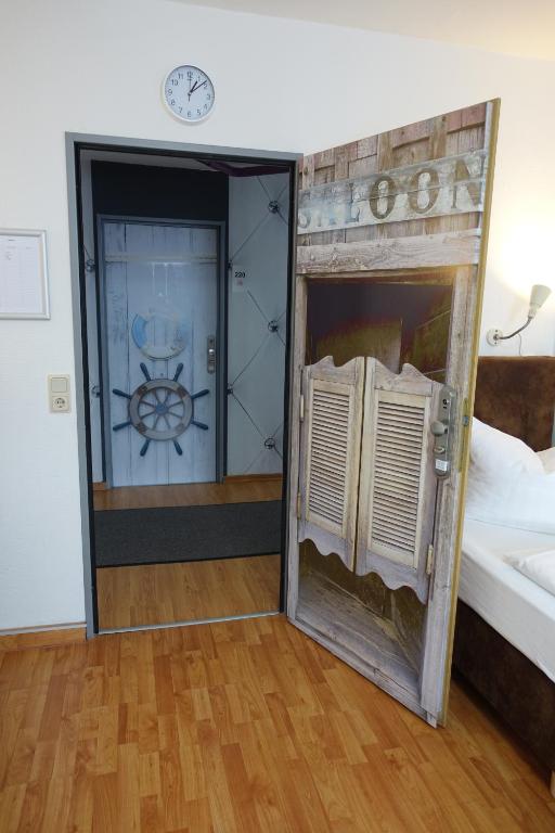 Postel nebo postele na pokoji v ubytování Stern Hotel