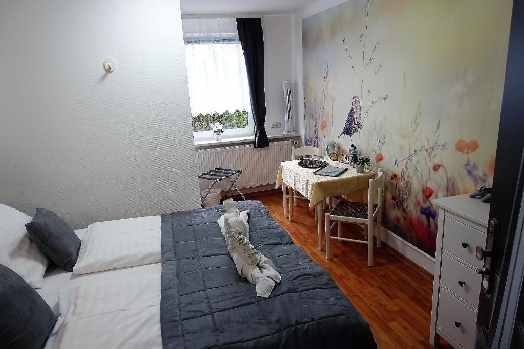 Postel nebo postele na pokoji v ubytování Stern Hotel