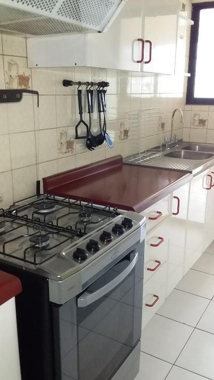 Kuchyň nebo kuchyňský kout v ubytování Apart Antofagasta