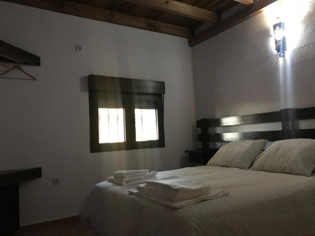 Postel nebo postele na pokoji v ubytování VTAR Don Benito, su casa rural en Gilena