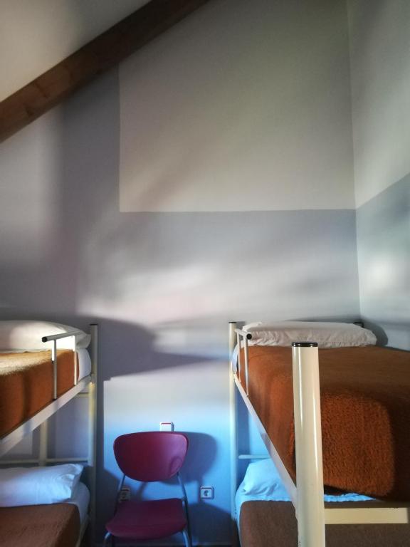 Postel nebo postele na pokoji v ubytování Albergue Albarracín