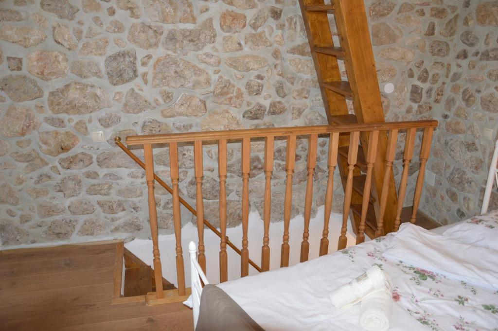 Posteľ alebo postele v izbe v ubytovaní Andrijana