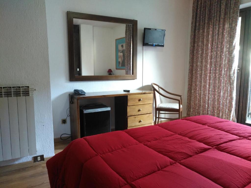 Postel nebo postele na pokoji v ubytování Hotel I Larici