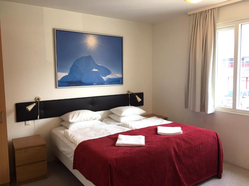 Postel nebo postele na pokoji v ubytování Downtown Reykjavík Apartments