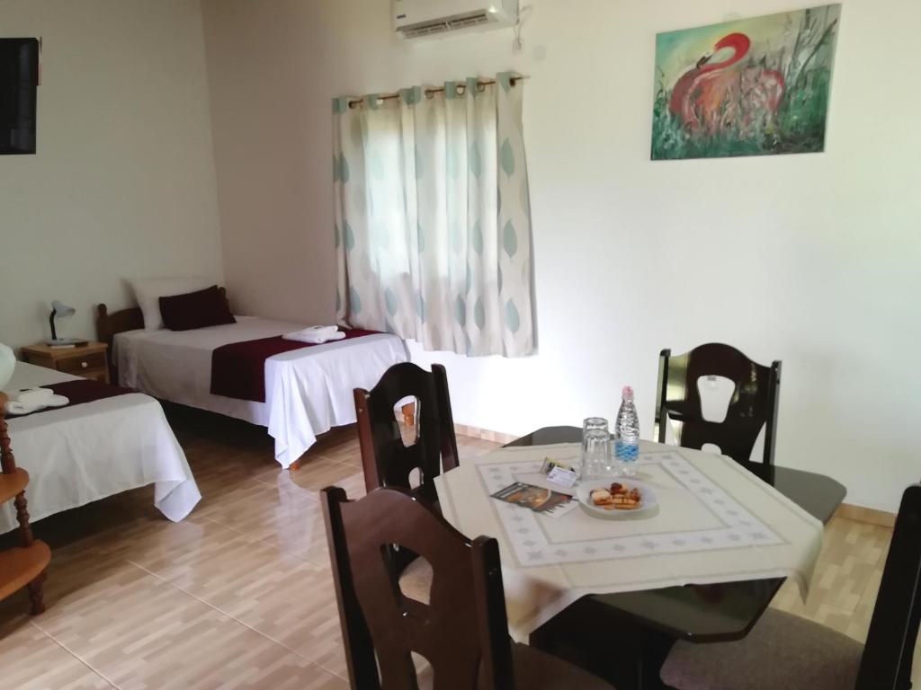 Postel nebo postele na pokoji v ubytování Posada Bavaria