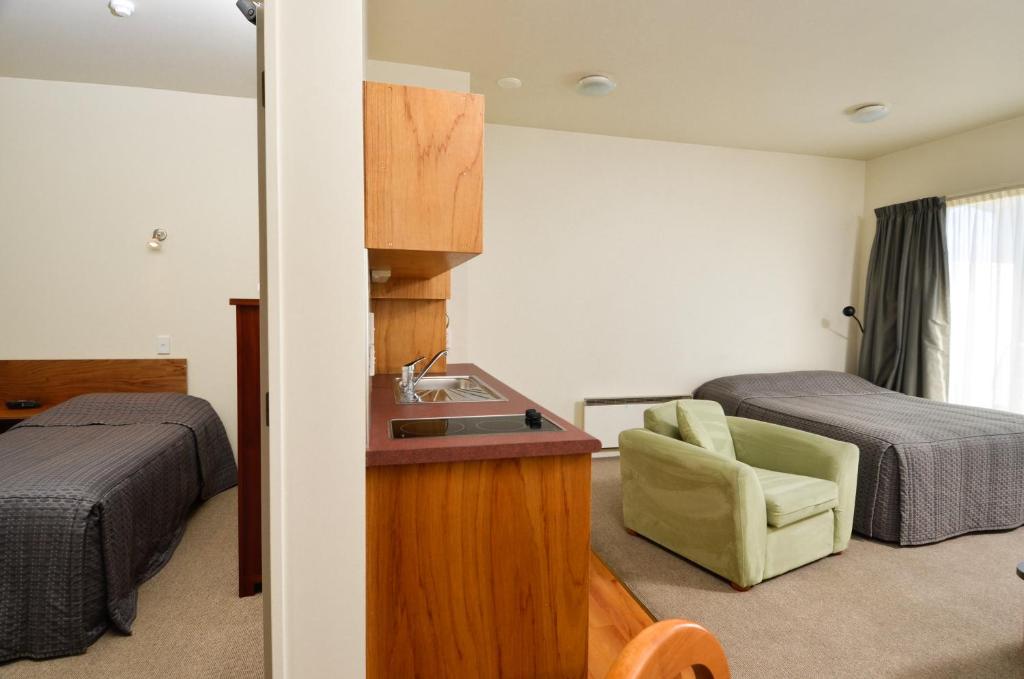 Postel nebo postele na pokoji v ubytování Parkside Motel