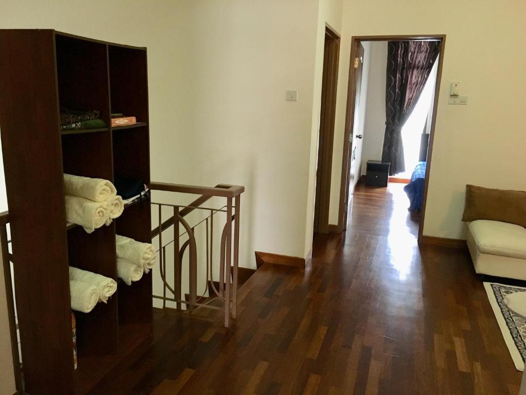 Postel nebo postele na pokoji v ubytování Putrajaya 1808 Homestay