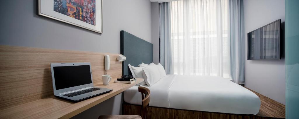 TV a/nebo společenská místnost v ubytování Hako Hotel