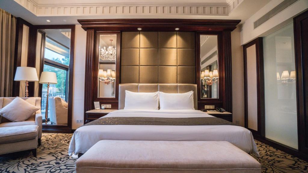 Postel nebo postele na pokoji v ubytování C&D Hotel Fuzhou