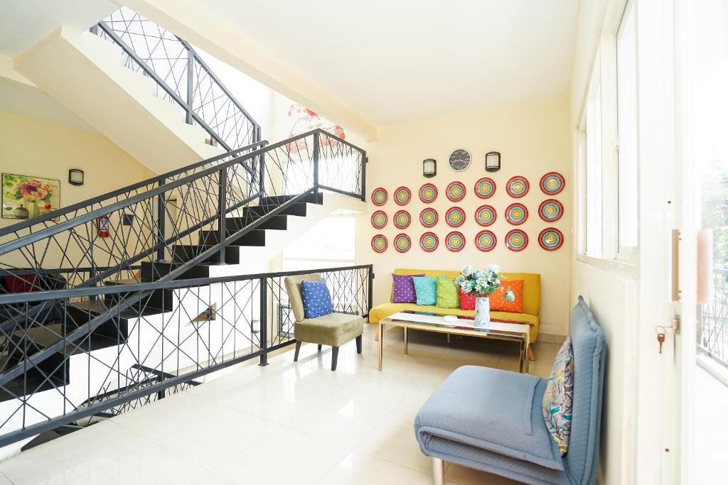 Posezení v ubytování Pratisarawirya Guesthouse by ecommerceloka